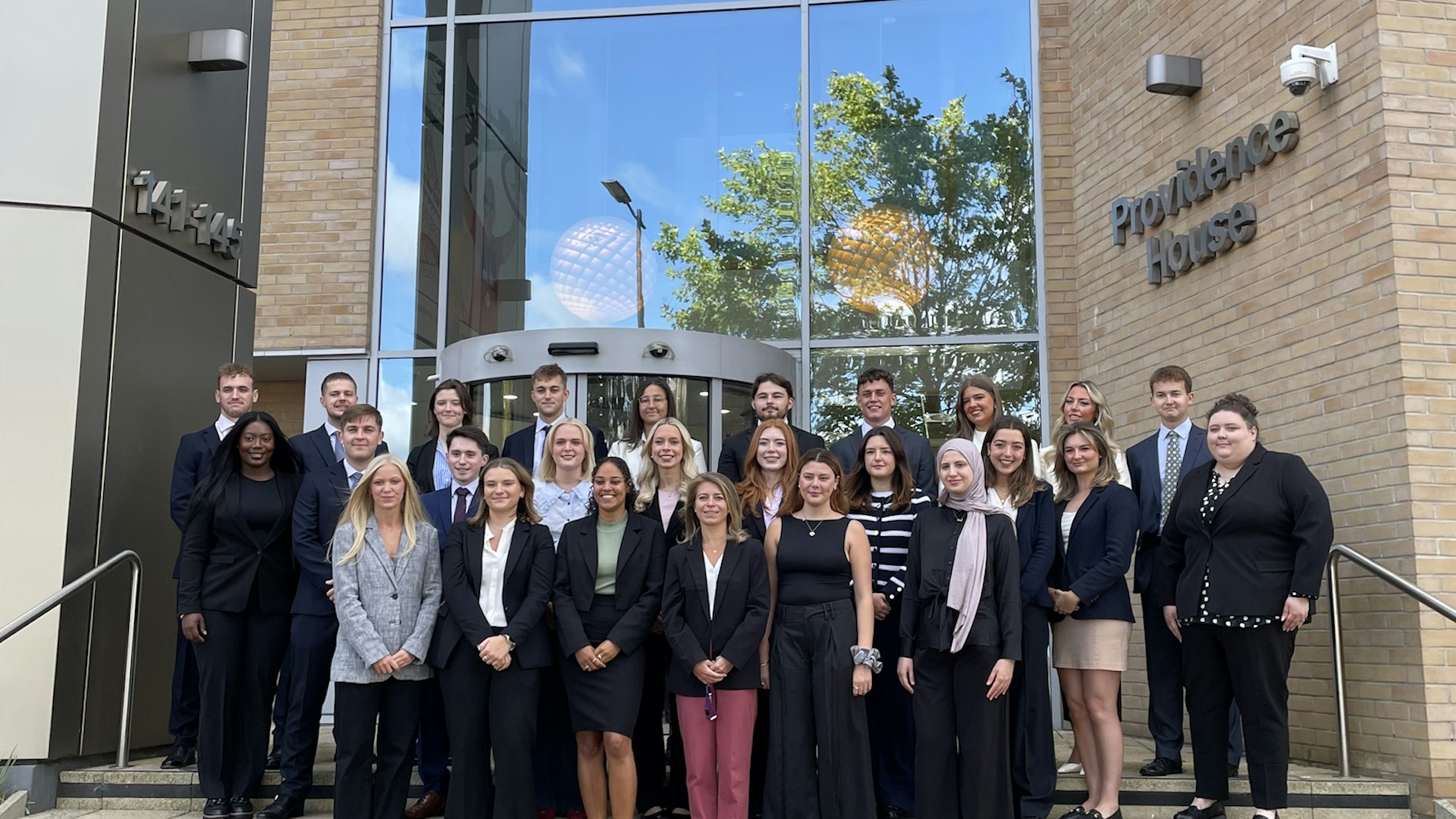 Group of people stood outside Birketts office building